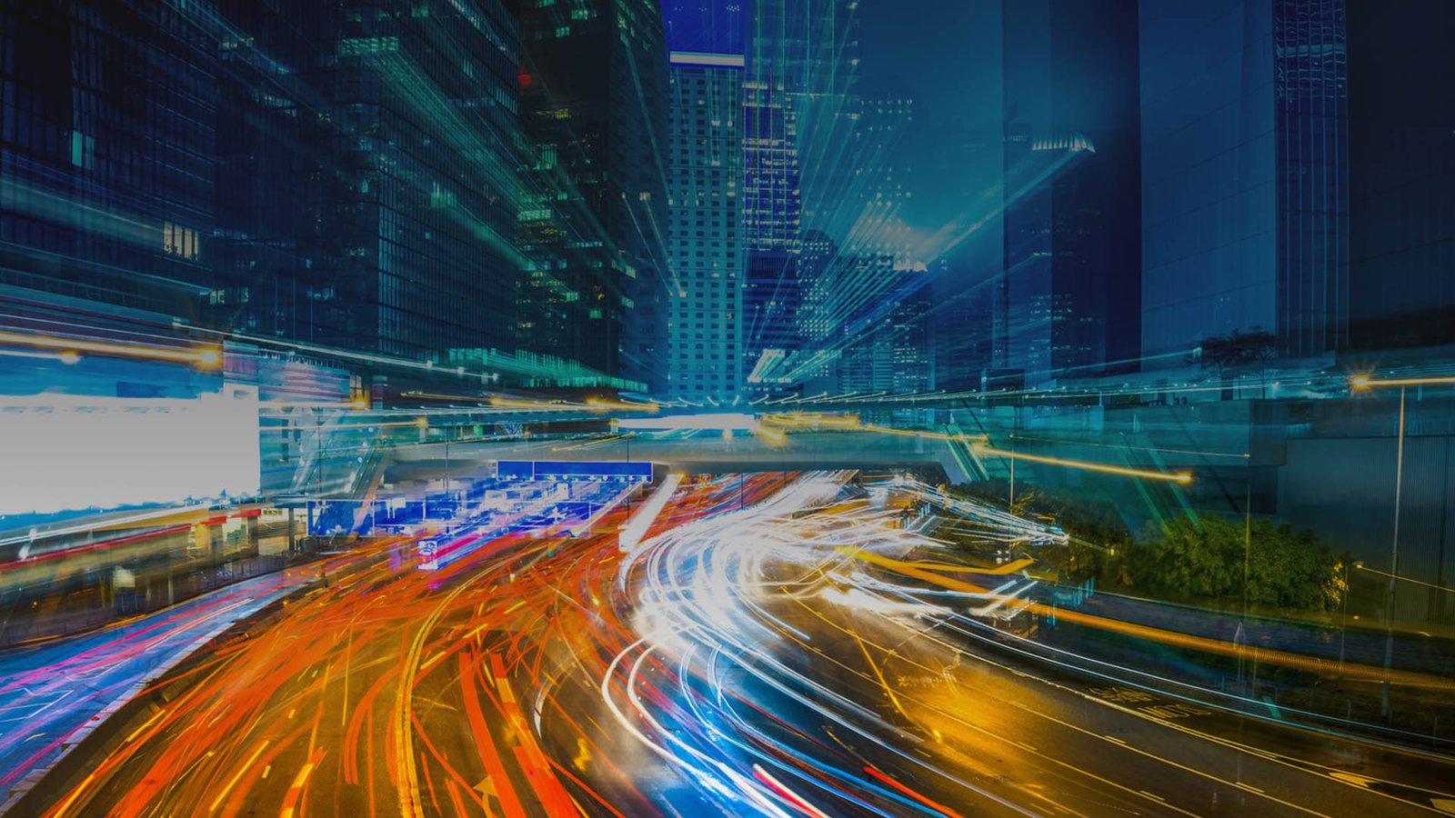 City skyline with light trails at night
